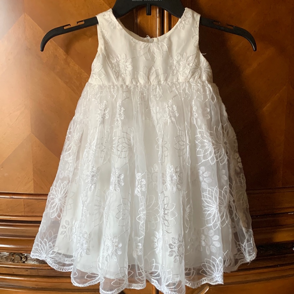 Formal dress for Flower Girl in size 2T, delicate ivory from David’s Bridal.